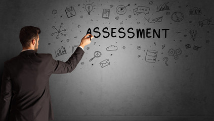 businessman drawing a creative idea sketch with ASSESSMENT inscription, business strategy concept