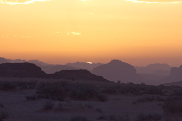 Landscape of Wadi Rum hills and desert in Jordan just before a beautiful sunset in the Spring