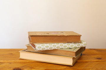 International book day, Sant Jordi, Literacy day. Old books on a wood surface