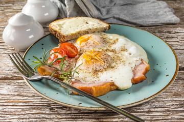 Fried eggs with pork ham.