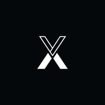  Minimal elegant monogram art logo. Outstanding professional trendy awesome artistic X XX XV VX initial based Alphabet icon logo. Premium Business logo White color on black background