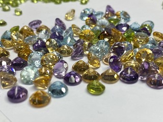 Collection of many different natural gemstones on the white background. Jewel Gem on White shine color, Collection of many different natural gemstones. Copy space with wallpaper