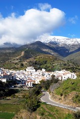 Fototapeta na wymiar View of the whitewashed village (pueblo blanco) in the mountains, Sedella, Spain.