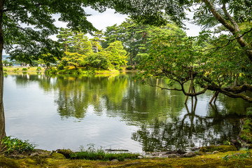 Fototapeta na wymiar View of Kenrokuen garden during summer in Kanazawa. It is considered one of the three most beautiful gardens of Japan