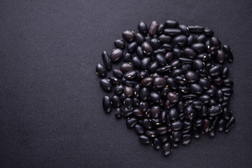 fresh organic natural beans on black background
