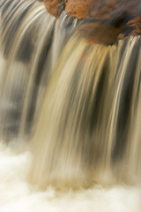 Landscape of the Lower Huron River Falls captured with motion blur, Sturgeon River,  Michigan's Upper Peninsula, USA