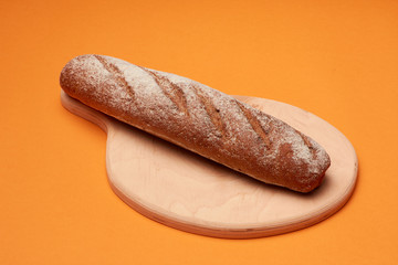 Sliced rye bread on a cutting board. Freshly Baked Bread