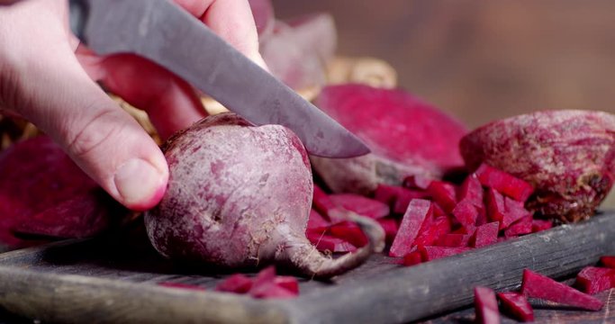 Sliced fresh beets on a cutting Board.