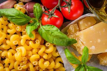 concept of traditional italian pasta with tomatoes and basil