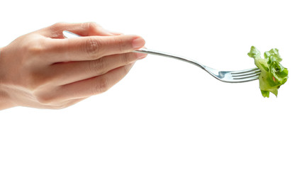 Close up hand holding salad vegetable fork on isolated white background
