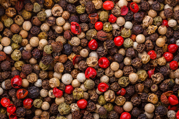 mix of peppercorns on white acrylic background - Powered by Adobe