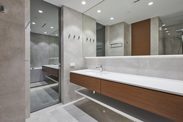 modern bathroom with mirror on the inside of the door
