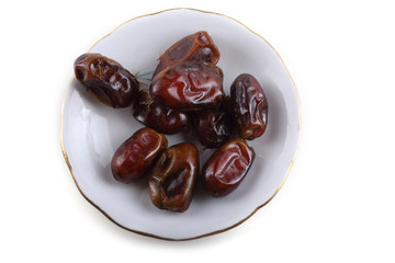 Date fruits isolated on white