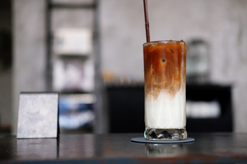glass of  iced coffee on wooden table