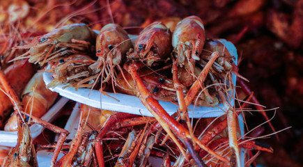 Red fried prawn for sale by street vendors