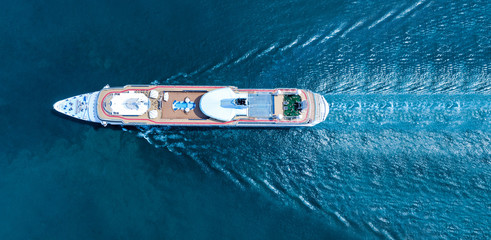 Aerial top view of beautiful white cruise ship  luxury cruise at the sea beach concept tourism...