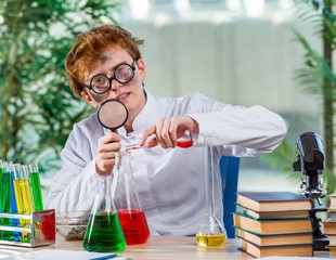 Young crazy chemist working in the lab