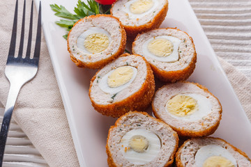 Scotch egg meat balls on rustic wooden background