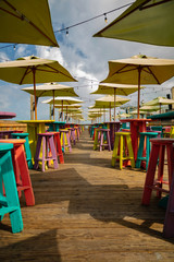 Bar stools and umbrellas await the lunch crowd in Key West, Florida