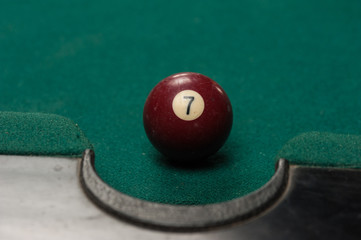 Billiards balls and cue on billiards table. Billiard sport concept