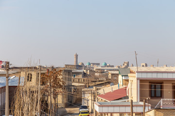 Fototapeta na wymiar Street in the historical center of Bukhara. Bukhara city, Uzbekistan