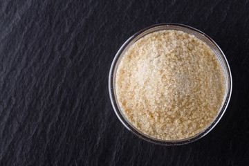 natural animal gelatin on a dark stone background