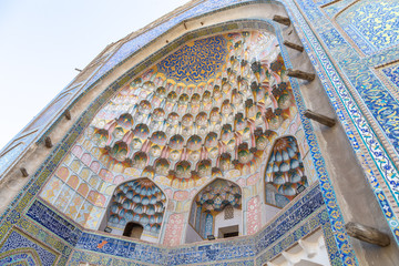 Ornament on the facade of the Madrasah of Abdulaziz Khan. Bukhara city, Uzbekistan