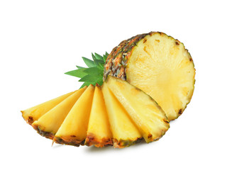 Ripe halved pineapple with juicy slices isolated on white background