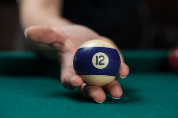 Billiards balls and cue on billiards table. Billiard sport concept