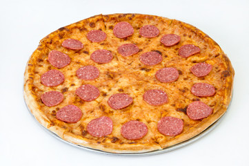 Pizza with salt and cheese on a dish on a white background