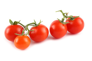 Red cherry tomatoes isolated on white