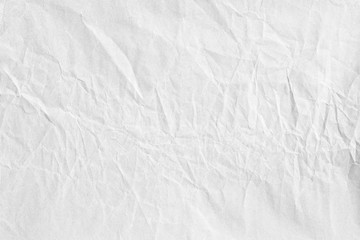 Fototapeta na wymiar Crumpled white paper background texture