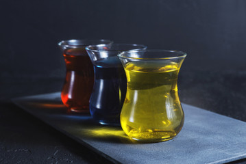 tea in a glass cup on a dark background
