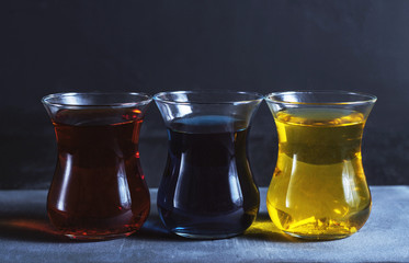 tea in a glass cup on a dark background
