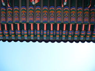 Naklejka premium Seoul, Korea - 23rd April 2020 : Coloful Giwa is a construction material for put roofing and tile. Traditional Korean roof construction in Gyeongbokgung Palace