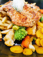 juicy steak beef meat with tomato and potatoes