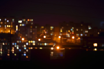 Fototapeta na wymiar Night city lights. Bokeh background