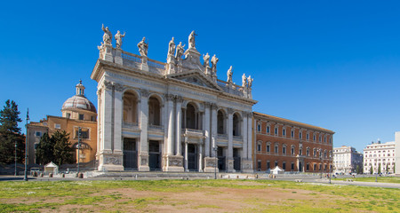 Fototapeta na wymiar Rome, Italy - following the coronavirus outbreak, the italian Government has decided for a massive curfew. Now, even cities like Rome look like ghost towns. Here in particular the S. Giovanni Basilica
