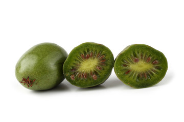 Little kiwi with halves (variegated-leaf hardy kiwi)