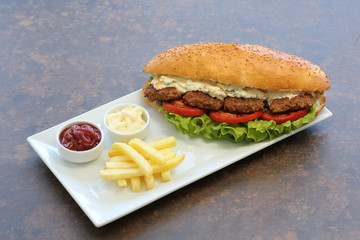 grilled meatballs and fried potatoes