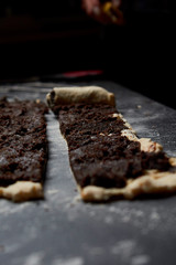 Baker prepares homemade cakes.