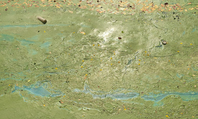 Abstract background. Art of nature, waste water surface. It's look like oil paint fluid of green and blue colour.
