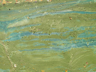 Abstract background. Art of nature, waste water surface. It's look like oil paint fluid of green and blue colour.