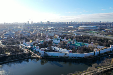 Fototapeta na wymiar panoramic views of the lake, the fortress and the Christian temple of the big metropolis taken from the drone