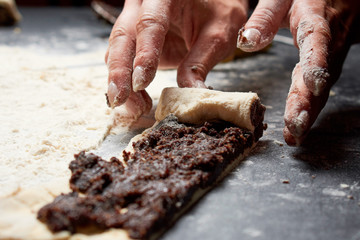 baker prepares homemade cakes