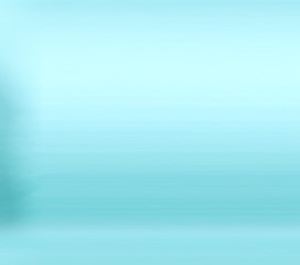 Empty photo studio with lighting equipment on blue background.