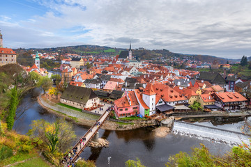 Fototapeta na wymiar View of Cesky Krumlov, Czech republic. Autumn cityscape with bend of Vltava river