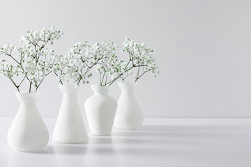 Home interior floral decor. Elegant floral soft white composition. Beautiful white gypsophila...