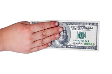 Human's hand holds a banknote of 100 US dollars with a portrait of American President Benjamin Franklinan isolated white background