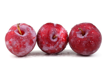 Three red plums